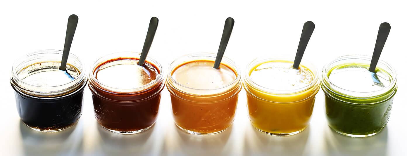 These 5 Easy Chicken Marinade Recipes -- Teriyaki, Enchilada, Tandoori, Honey Mustard and Pesto -- are freezer-friendly, perfect for #mealprep, naturally #glutenfree, and SO delicious. Use them for grilling, baking, stir-frying, or however you prefer! | gimmesomeoven.com #chicken #healthy #mealprep #dinner #recipe #marinade Easy Chicken Marinades