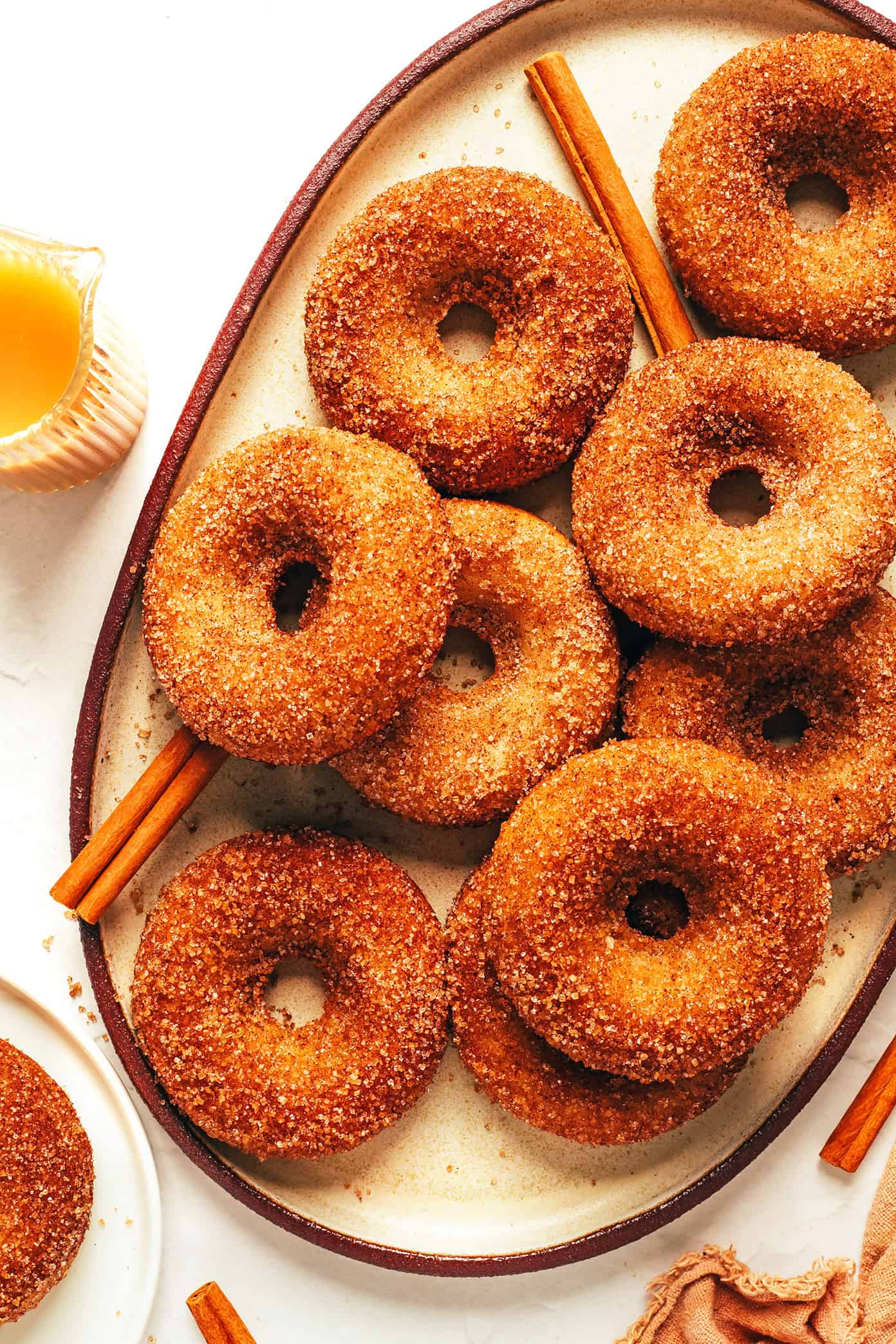baked apple cider donuts on a platter