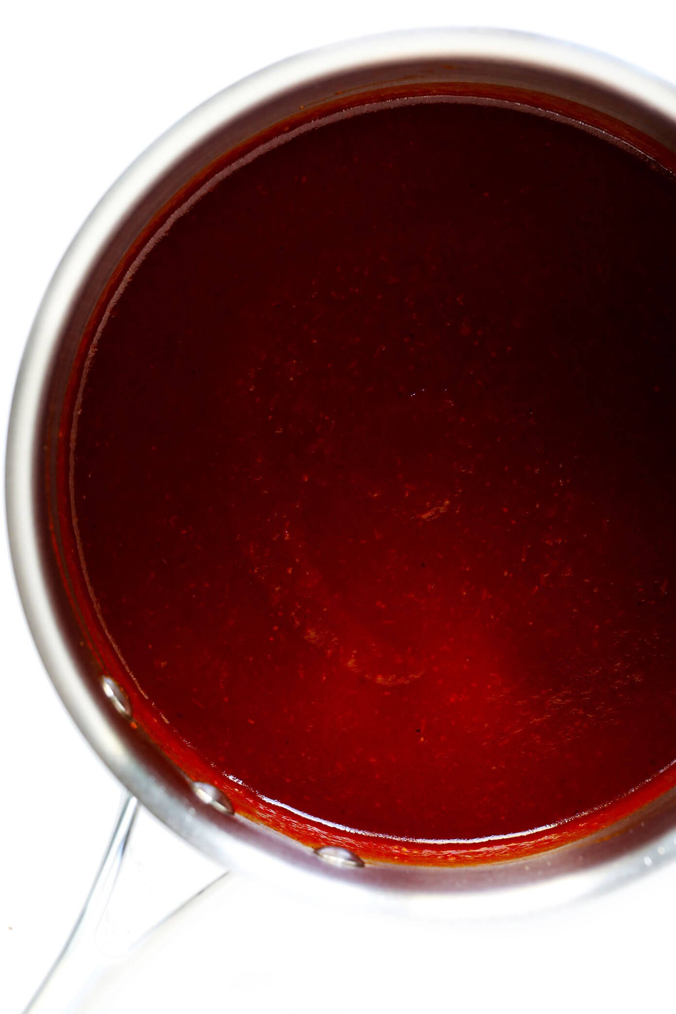 This Kansas City-style homemade BBQ sauce recipe is super quick and easy to make, and full of the best tangy, smoky and slightly-sweet flavors that everyone is sure to love! Add it to chicken, pork, ribs, pizza, salad, tacos or whatever sounds good. | gimmesomeoven.com #bbq #sauce #barbecue #homemade #summer #grilled #chicken #pork #glutenfree #healthy How To Make BBQ Sauce