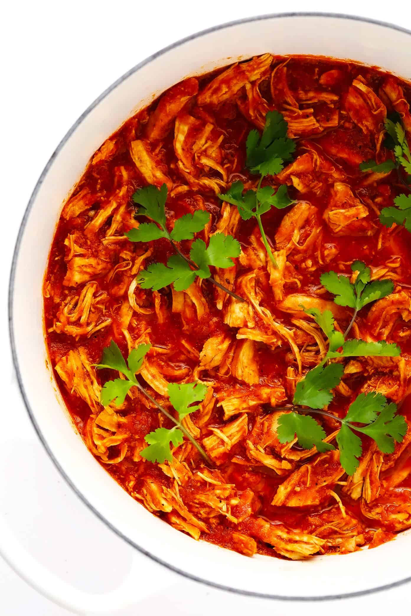 This Mexican Chicken Tinga recipe is remarkably quick and easy to make in 30 minutes and tossed with the best smoky, savory, and slightly-sweet tomato sauce. It's naturally gluten-free and perfect for serving for dinner in tacos, tostadas, burritos, quesadillas and more! | gimmesomeoven.com Easy Chicken Tinga in Stockpot