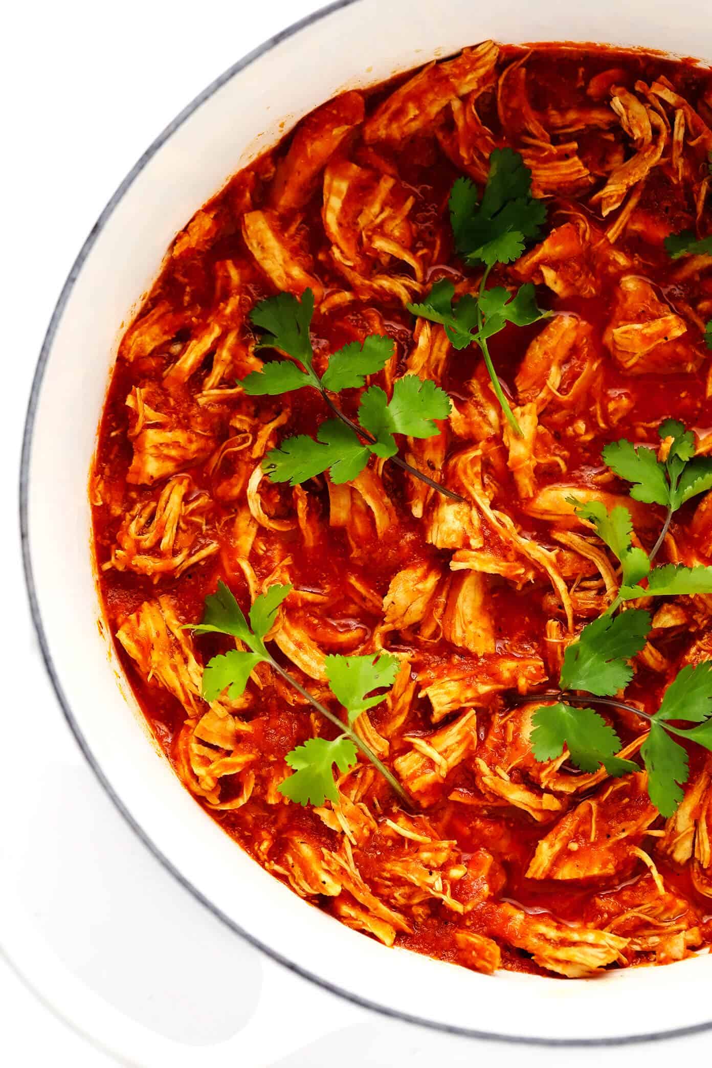 This Mexican Chicken Tinga recipe is remarkably quick and easy to make in 30 minutes and tossed with the best smoky, savory, and slightly-sweet tomato sauce. It's naturally gluten-free and perfect for serving for dinner in tacos, tostadas, burritos, quesadillas and more! | gimmesomeoven.com Chicken Tinga
