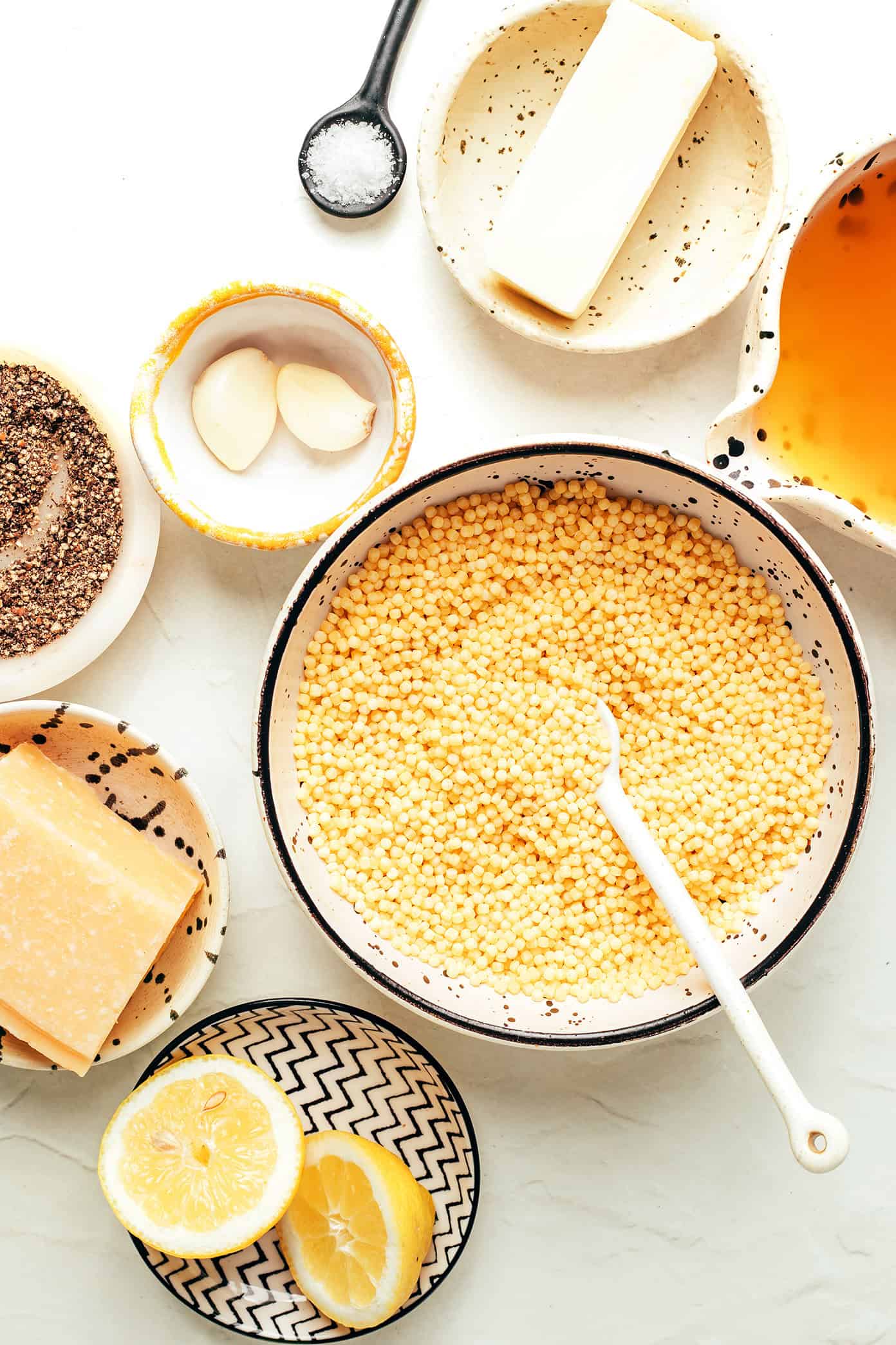 This lemon Parmesan pearl couscous recipe is a simple, versatile, and delicious side dish that pairs beautifully with everything from roasted veggies to grilled meats and more. | gimmesomeoven.com Lemon Parmesan Pearl Couscous Ingredients