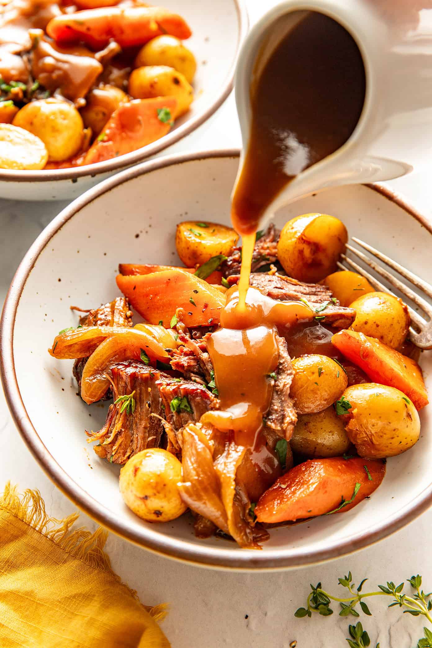 pot roast in a bowl with gravy