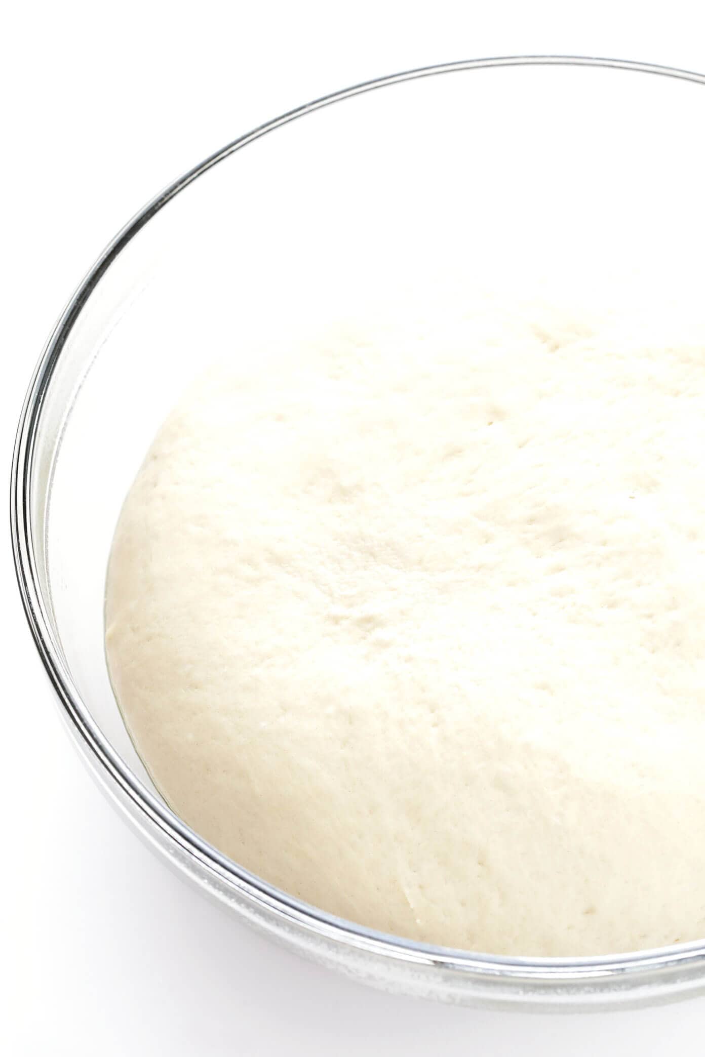 This delicious Rosemary Focaccia Bread recipe is easy to make, and topped with fresh rosemary, olive oil and flaky sea salt. Easy to make as a side for dinner, and it also freezes well! | gimmesomeoven.com #focaccia #bread #italian #side #vegetarian #baking Easy Focaccia Bread Dough